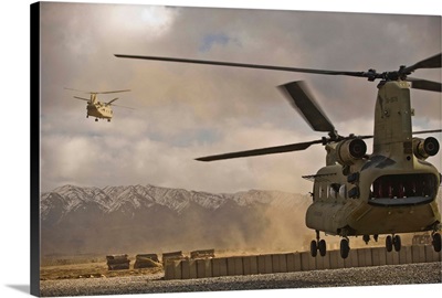 US Army CH-47 Chinook helicopters depart a military base in Afghanistan