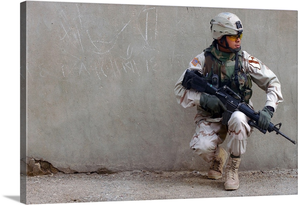 U.S. Army soldier armed with a 5.56mm M16A2.