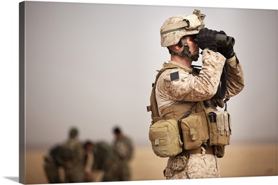 US Marine Determines Target Placement At A Target Range In Afghanistan