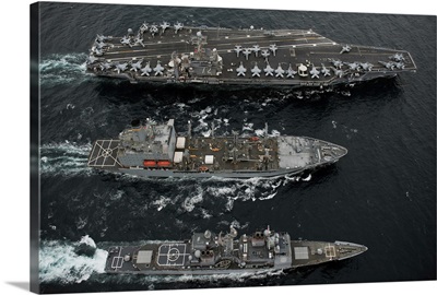 US Navy ships conduct a replenishment at sea in the Pacific Ocean