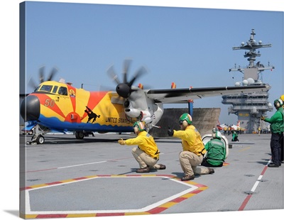 US Navy shooters launch a C-2A Greyhound from the USS George H.W. Bush