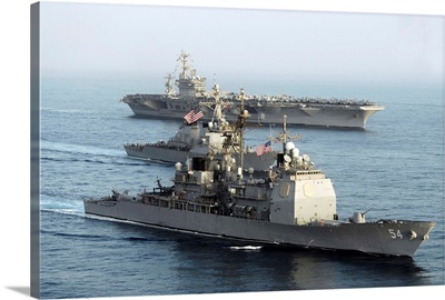 USS Antietam, USS Nimitz, and USS Higgins transit through the Gulf of Oman