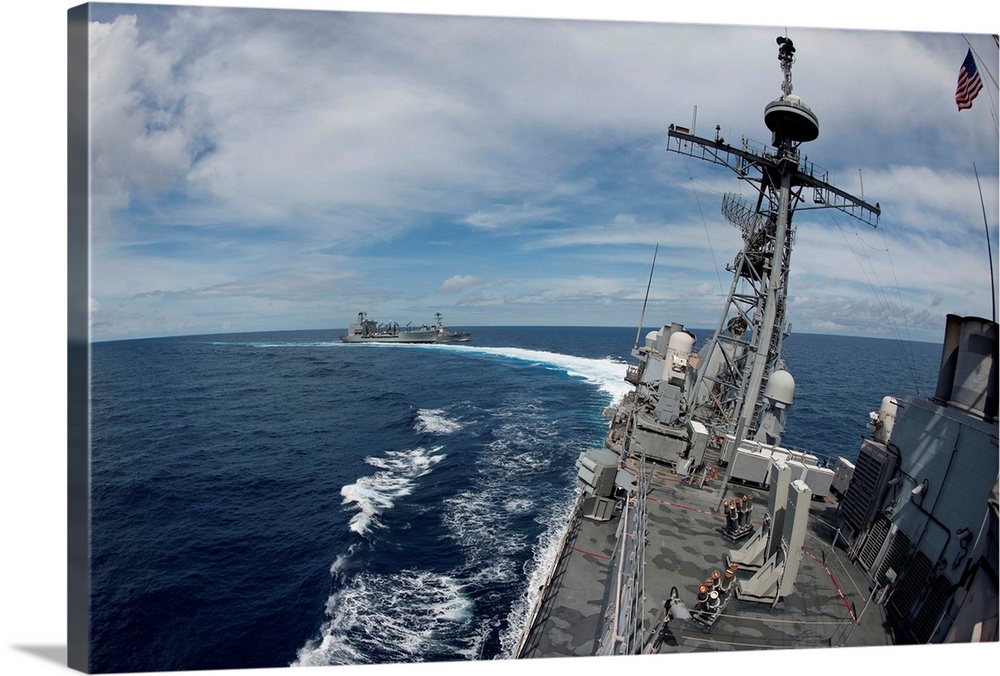 USS Cowpens makes a high speed turn after an underway replenishment.