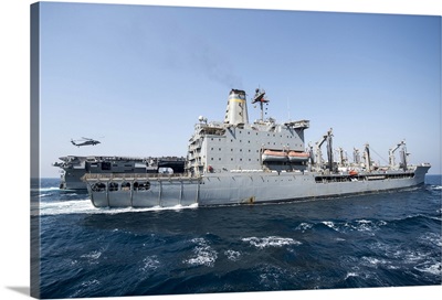 USS George H.W. Bush Performs A Replenishment-At-Sea With USNS Tippecanoe