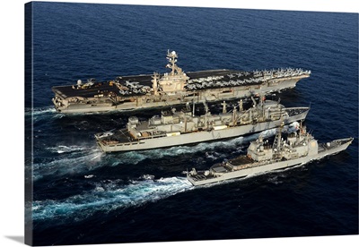 USS John C. Stennis, USS Mobile Bay and USNS Bridge during a replenishment at sea
