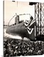 image thumbnail of January 21, 1954 - The nuclear-powered submarine USS Nautilus (SSN 571) slips into the Thames River.