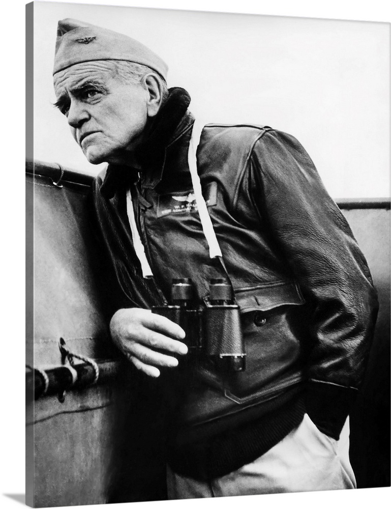 Vice Admiral William F. Halsey peering from the bridge of his ship during World War II.