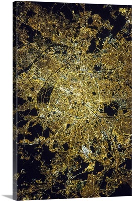 View from space of Paris, France, showing pattern of the street grid and city lights