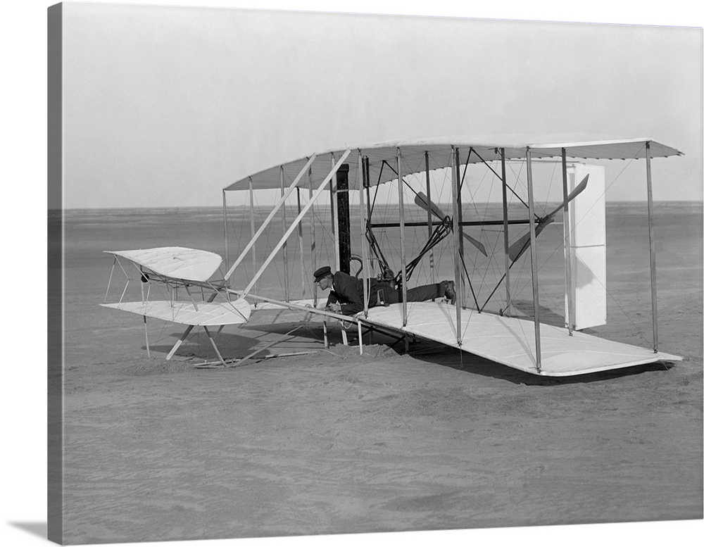 December 14, 1903 - Wilbur Wright lying in a damaged prototype after an unsuccessful flying attempt in Kitty Hawk, North C...
