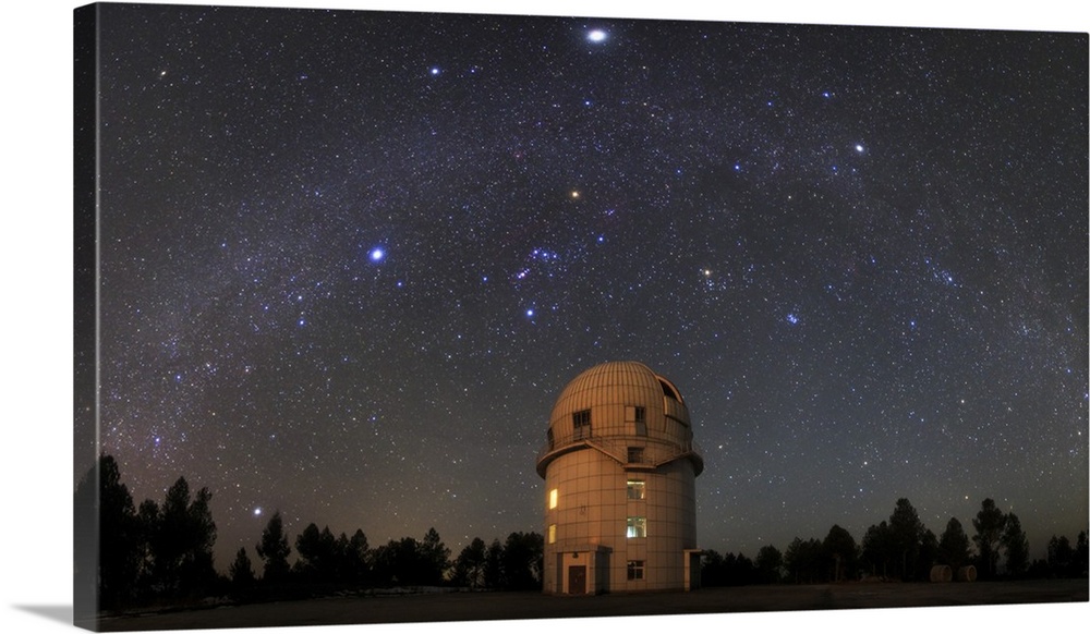 The arc of winter Milky Way is photographed in this panoramic photo from Yunnan Astronomical Observatory in southwestern C...