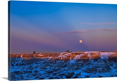 Winter Moonrise In Crepuscular Rays Over The Badlands Of Horseshoe Canyon