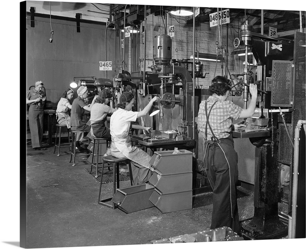 Women drill press operators working in a west coast airplane factory, circa 1942.