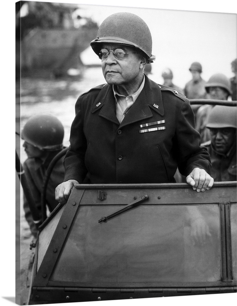 World War II photograph of General Benjamin O. Davis overseeing troops in France.