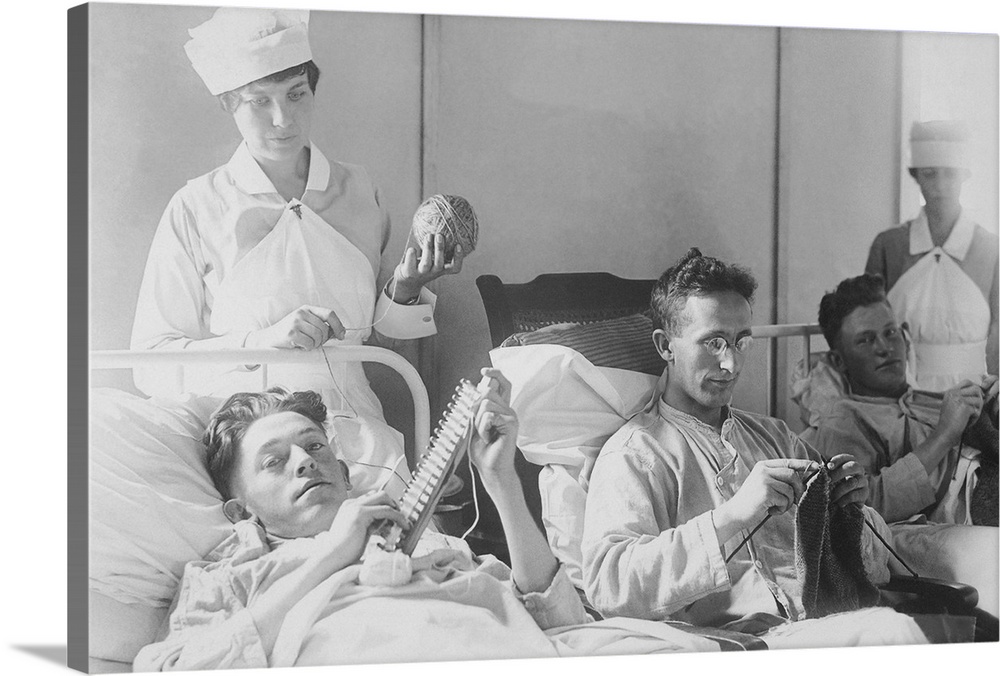Wounded soldiers knitting under the watchful eye of nurses, 1918.