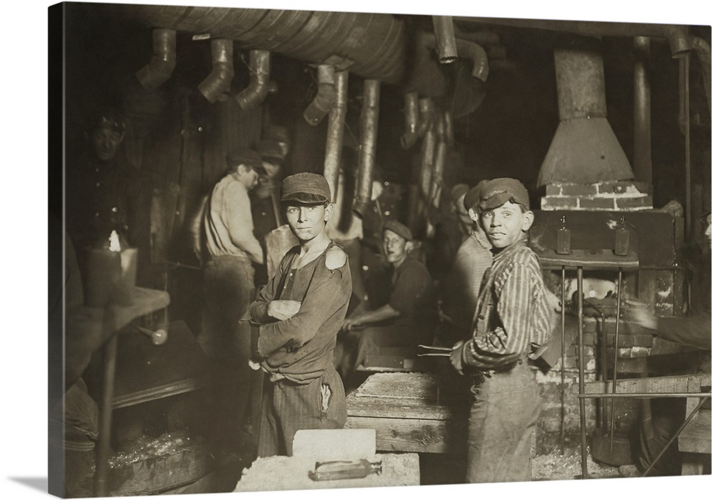 Young child labor workers in a glass factory in Indiana at midnight, 1908.