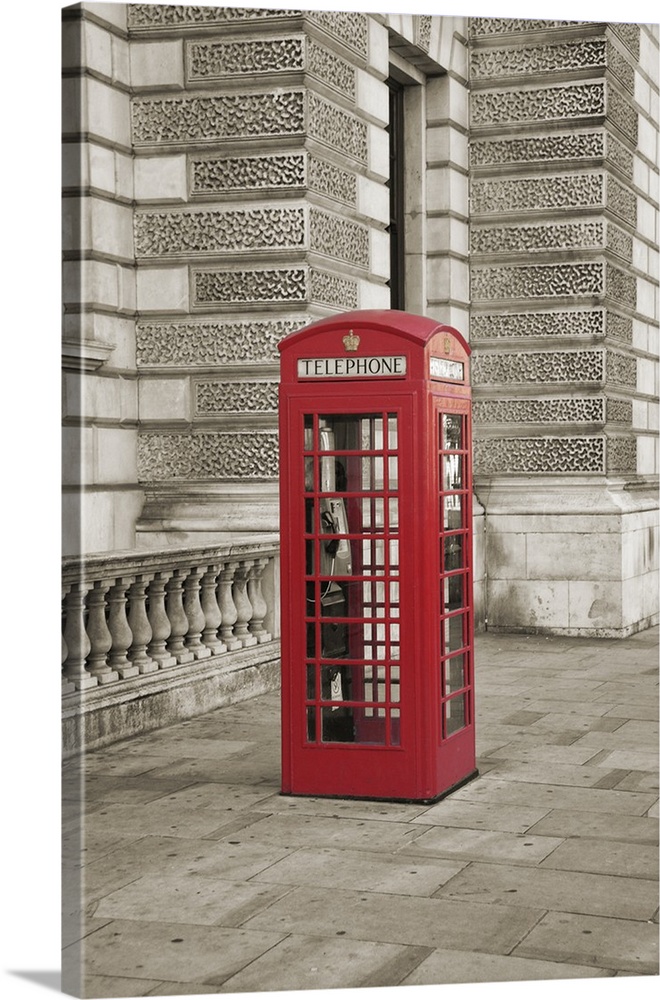 Photo of a phone booth colored red in London, England.