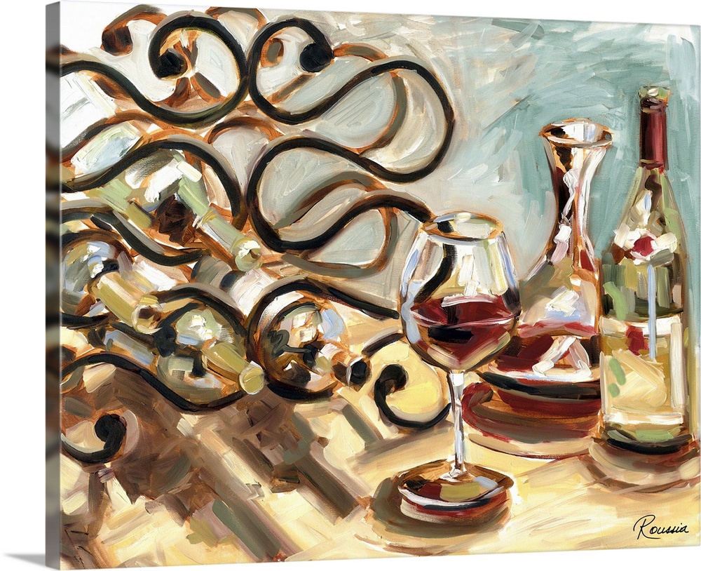 A glass decanter and wine glass with wine bottles in a decorative stand.