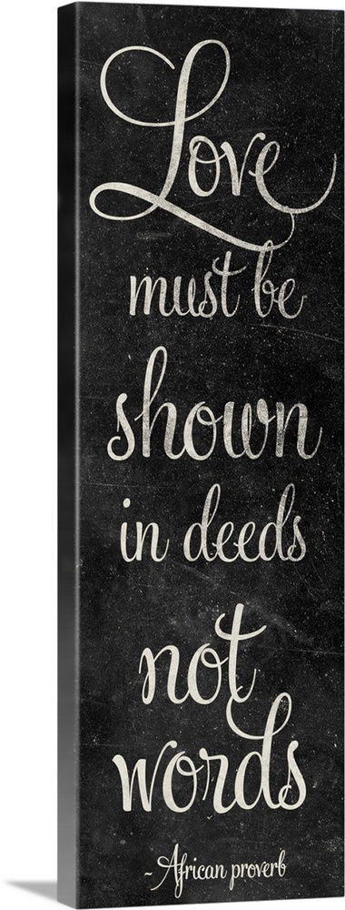 "Love must be shown in deeds not words" in script writing on a chalkboard style panel.
