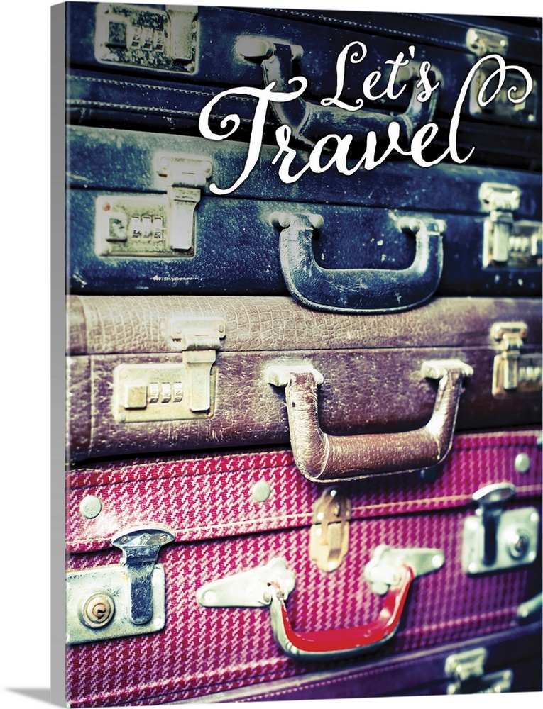 Image of a stack of vintage suitcases with "Let's Travel" written in a script font.