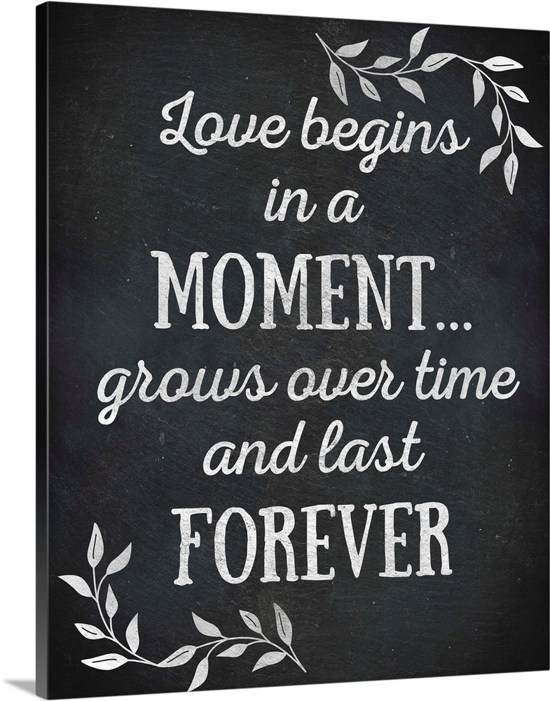 Chalkboard sign that reads "Love begins in a Moment... grows over time and lasts Forever"
