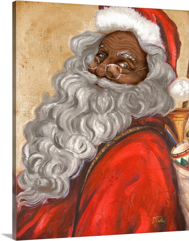 Portrait of a smiling Santa Claus with a long beard carrying a bag of presents.