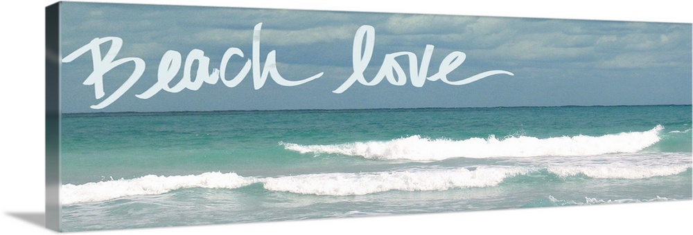 Horizontal photograph of rolling waves in the ocean with "Beach love" handwritten in the sky.