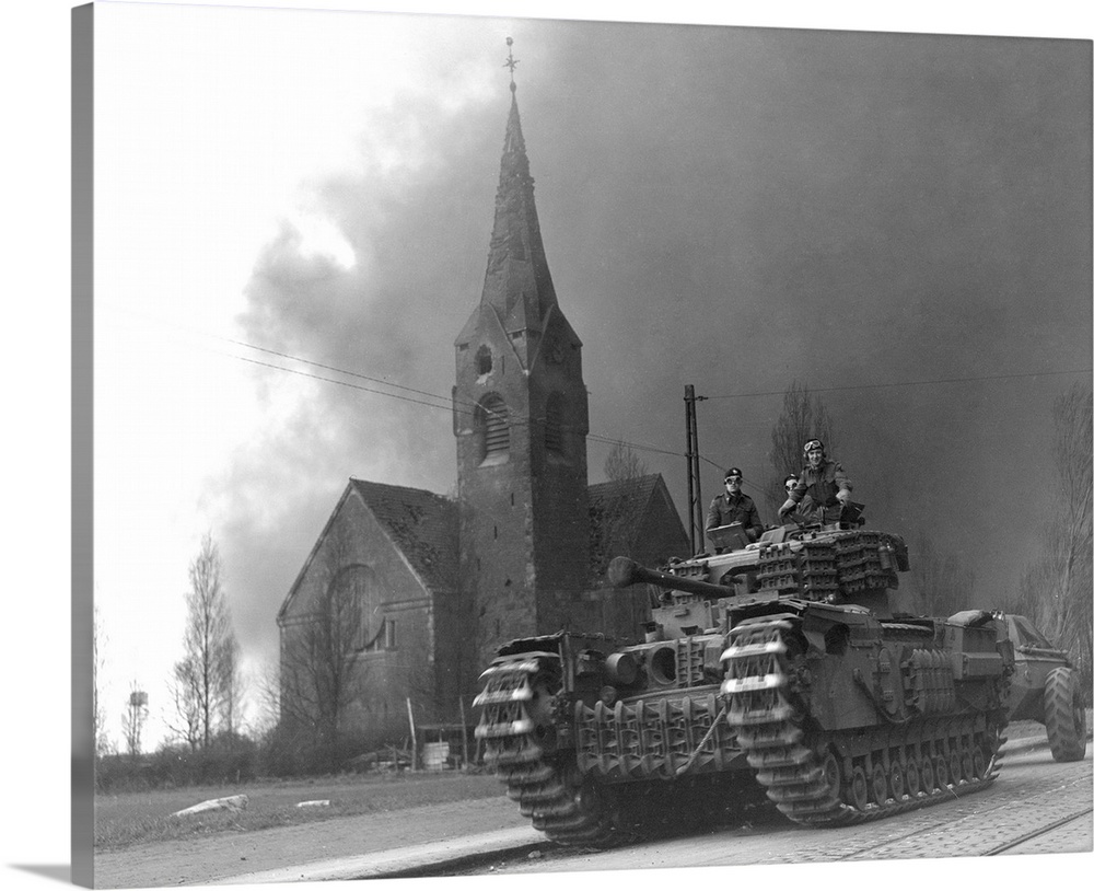 A British Churchill flame throwing tank in Sterkrade, Germany, against a background of smoke from the synthetic oil refine...