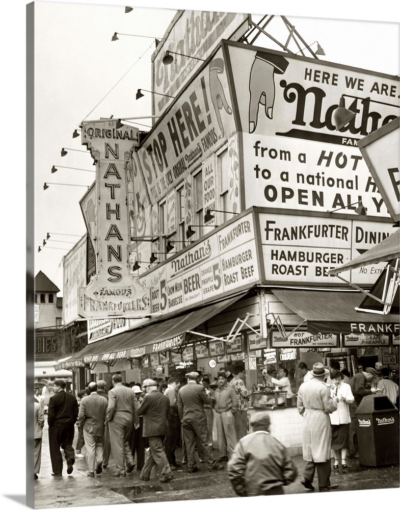 A crowd outside of Nathan's Famous in Coney Island, Brooklyn, New York. Photograph by Al Ravenna, 1954.