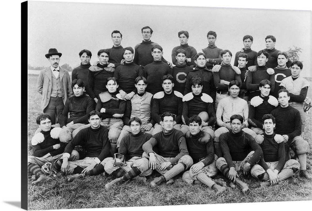 A Native American football team at the Carlisle Indian Industrial School in Carlisle, Pennsylvania. Photograph by John N. ...