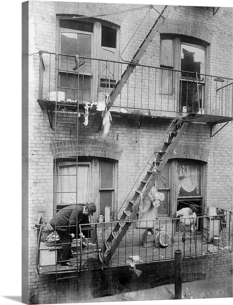 A public health inspector searching for mosquito breeding areas in tenement buildings, in an effort to prevent the spread ...