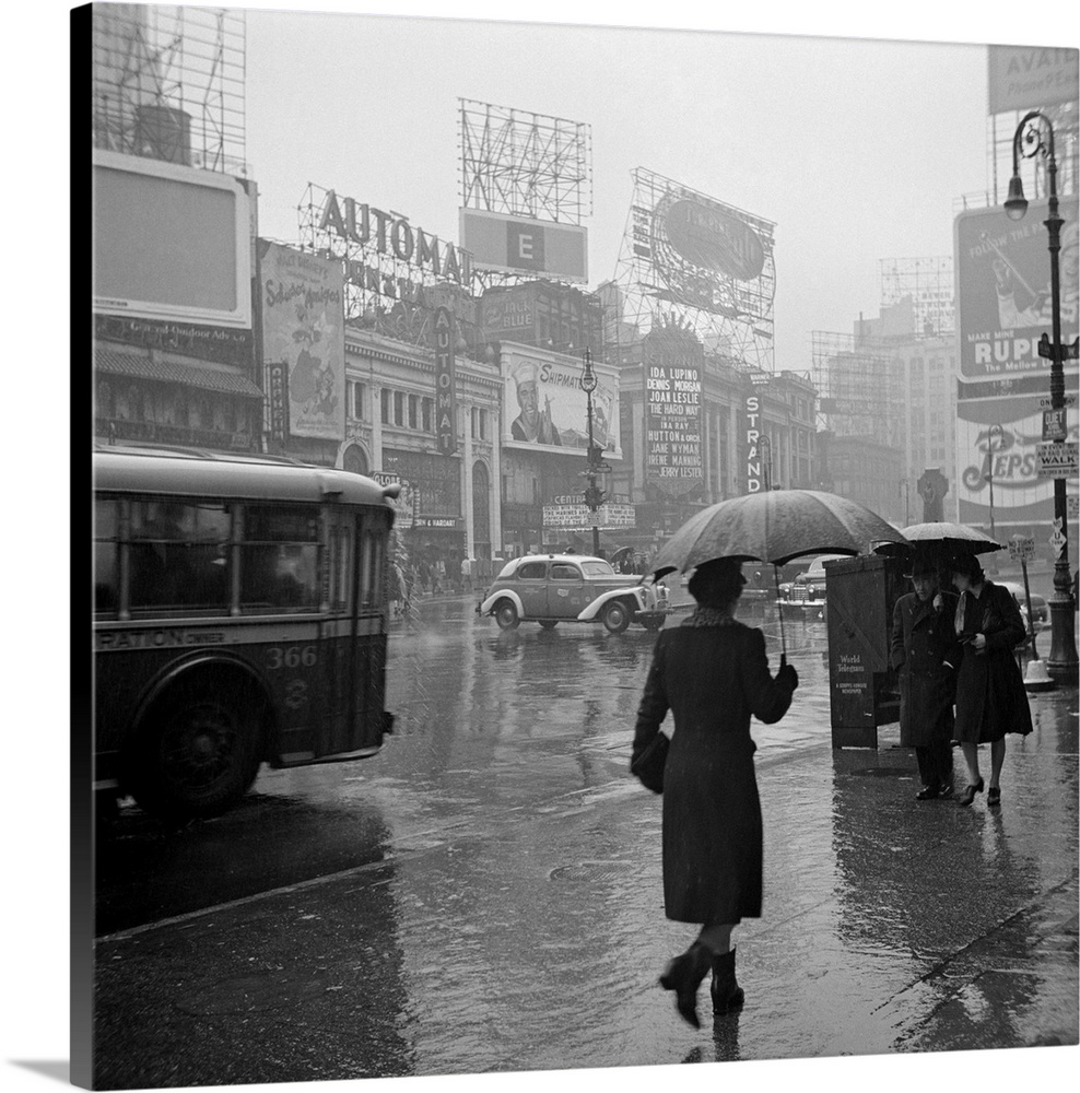 A rainy day in Times Square, New York City. Photograph by John Vachon, 1943.