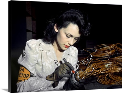 A woman working at the Vega Aircraft Corporation plant in Burbank, California, 1942