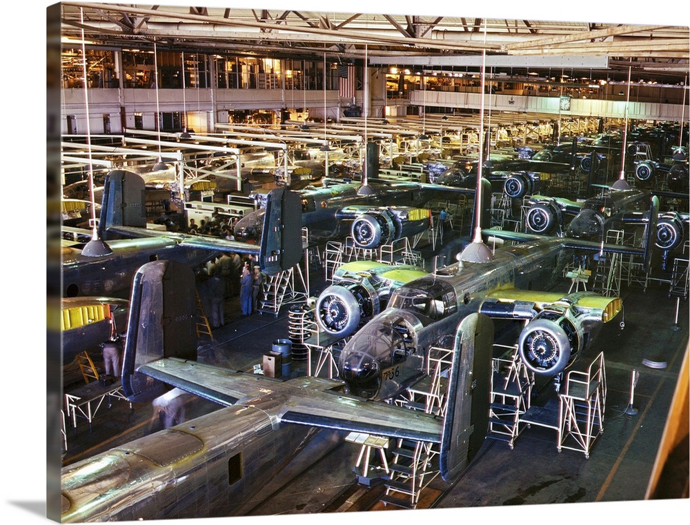 Assembly line production of B-25 bomber aircraft at the North American Aviation plant in Inglewood, California, during Wor...