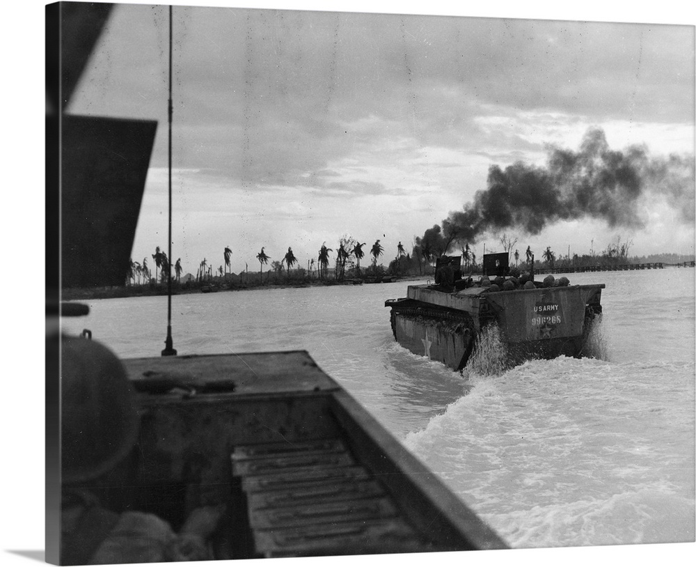 American amphibious tanks landing on Ngesebus Island during the Battle of Peleliu in the present Palau Islands. Photograph...