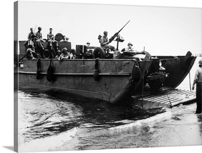 American landing craft dropping its ramp on the beach at Guadalcanal, Solomon Islands