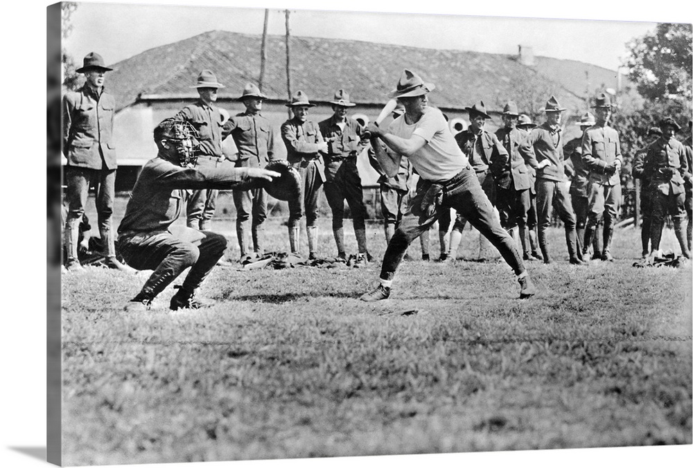 American soldiers playing baseball in Europe during World War I, with equipment donated by the Y.M.C.A. Photograph, c1917.