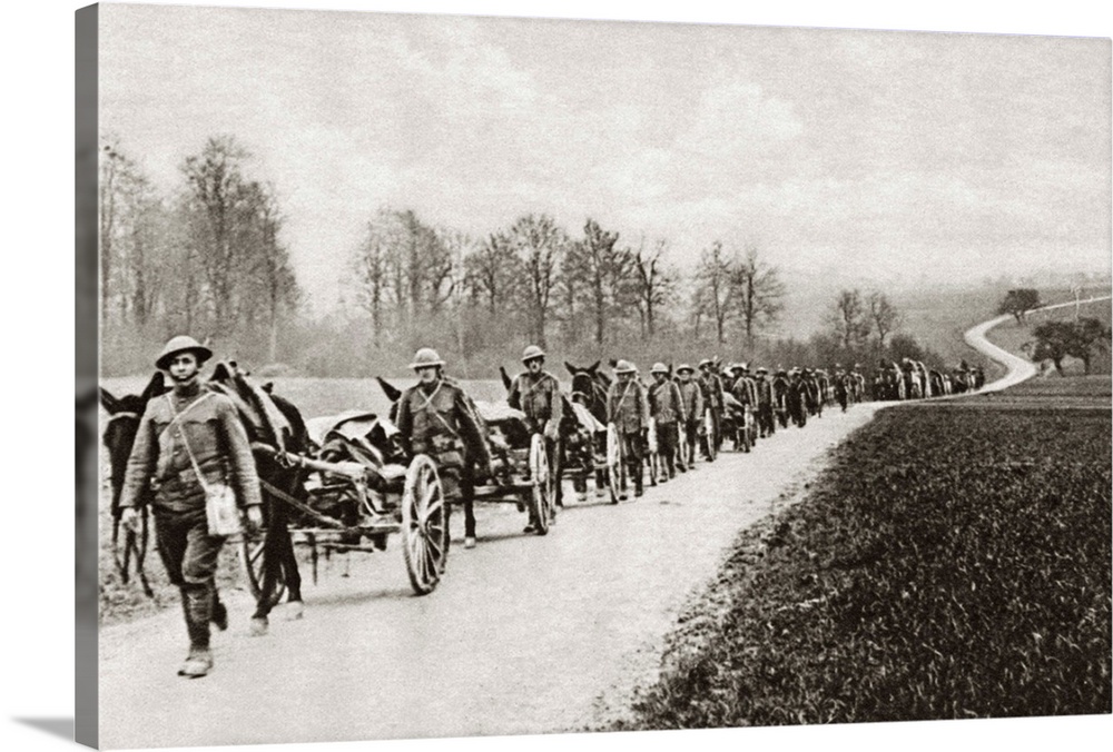 An American machine-gun section marching along a road in Flanders during World War I. Photograph, c1917.