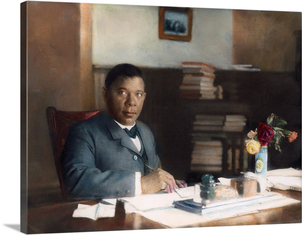 BOOKER T. WASHINGTON (1856-1915). American educator in his office at Tuskegee Institute, Alabama. Oil over a photograph, c...