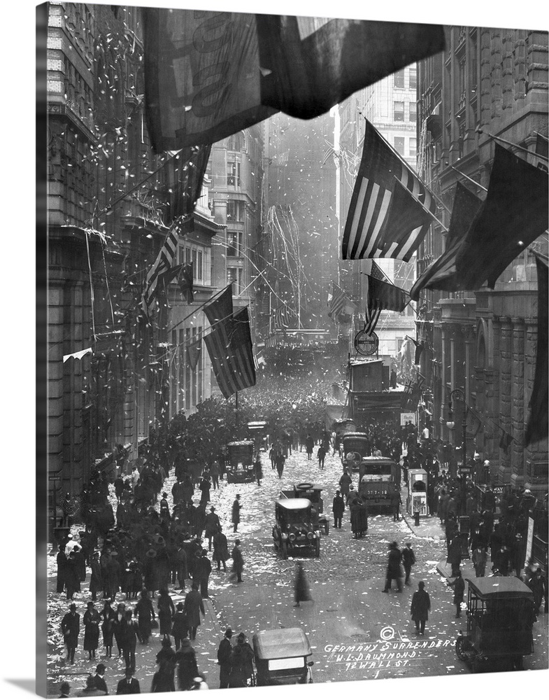Celebrations on Wall Street in New York City, following the Armistice with Germany after World War I. Photograph, 1918.