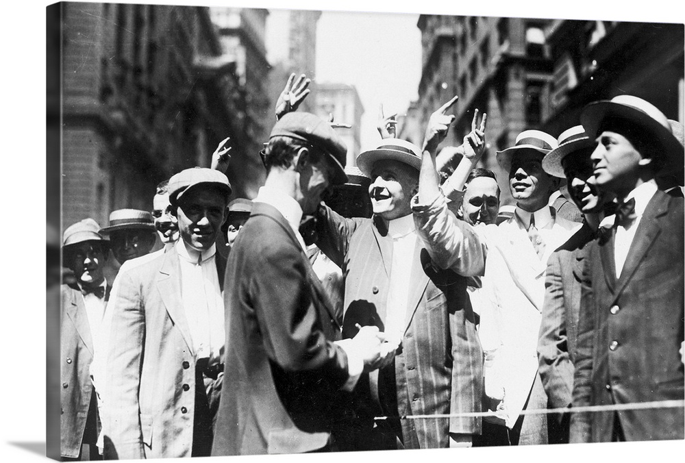 Stock brokers trading on the New York Curb Association market, with brokers and clients signaling from street to offices. ...