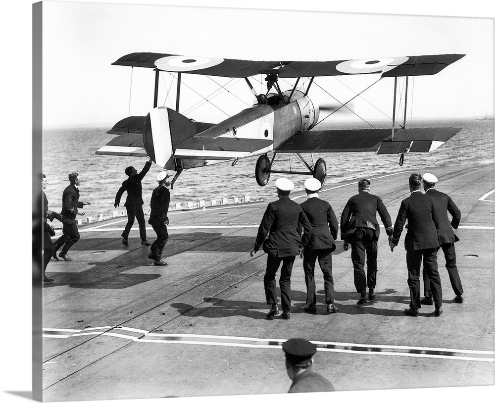 Squadron Commander Edwin Harris Dunning landing his Sopwith Pup biplane on the HMS 'Furious,' the first plane ever to be l...