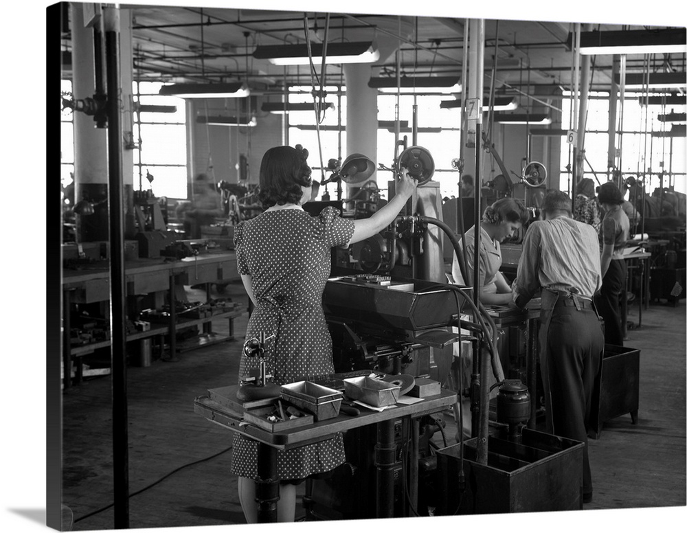 Estelle Wilson working in a Gillette factory converted to war production work, in Boston, Massachusetts. Photograph by How...