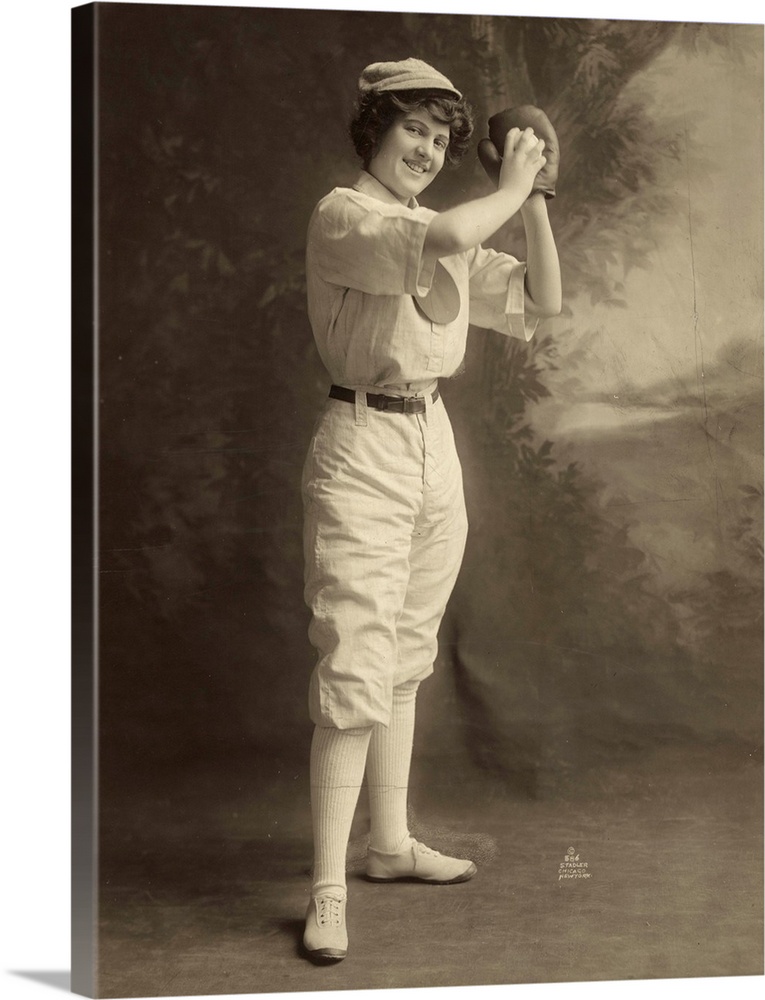 A female baseball player, in uniform, in a pitcher stance. Photograph, 1913.