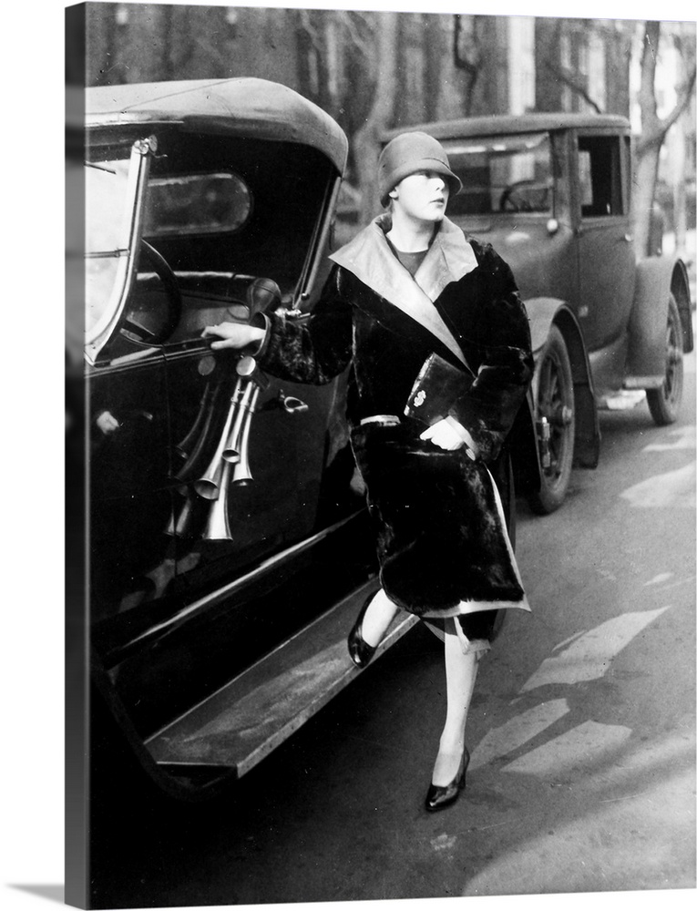 Suzette Dewey, daughter of Assistant Secretary to the Treasury Charles Dewey, beside her roadster, Washington, D.C., 1926.
