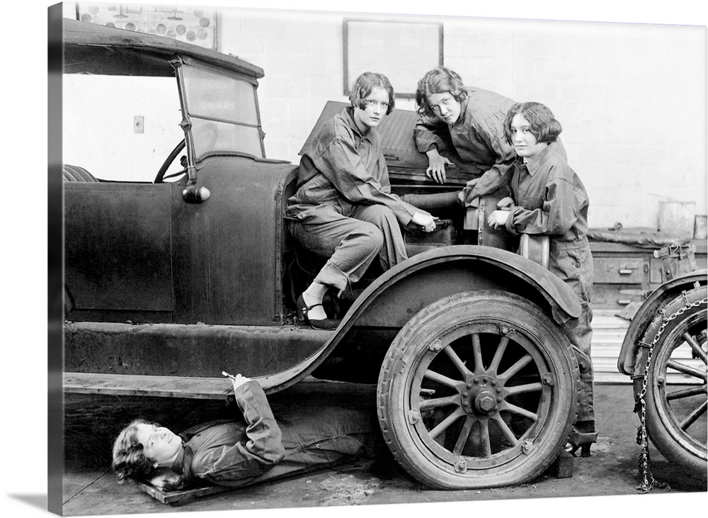 A group of high school girls learning automobile mechanics at Central High School in Washington, D.C., 1927.