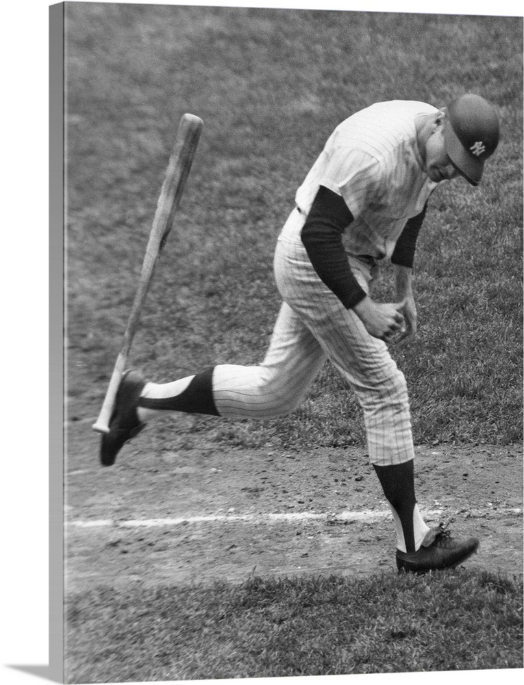 American baseball player. As a member of the New York Yankees, tossing his bat aside and beginning his trot around the bas...