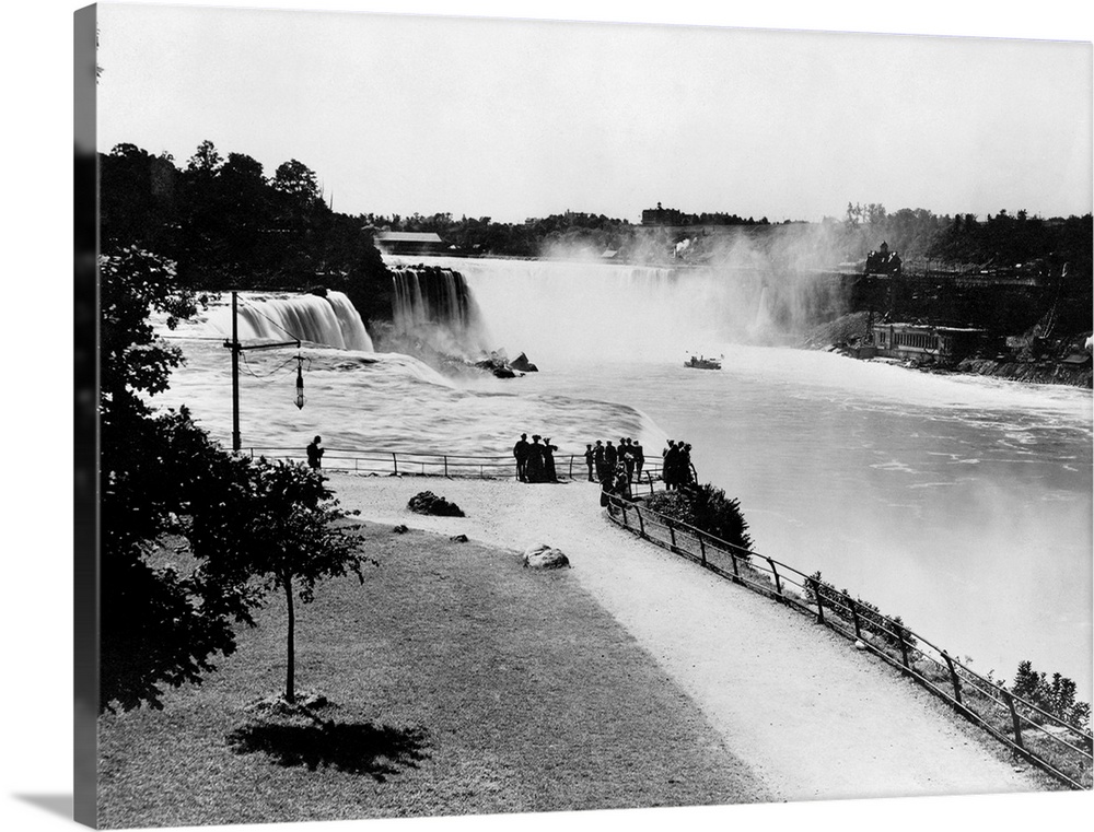Niagara Falls, C1905. A Group Of People Standing At A Lookout Point, Viewing Niagara Falls In the Distance. Photograph, C1...