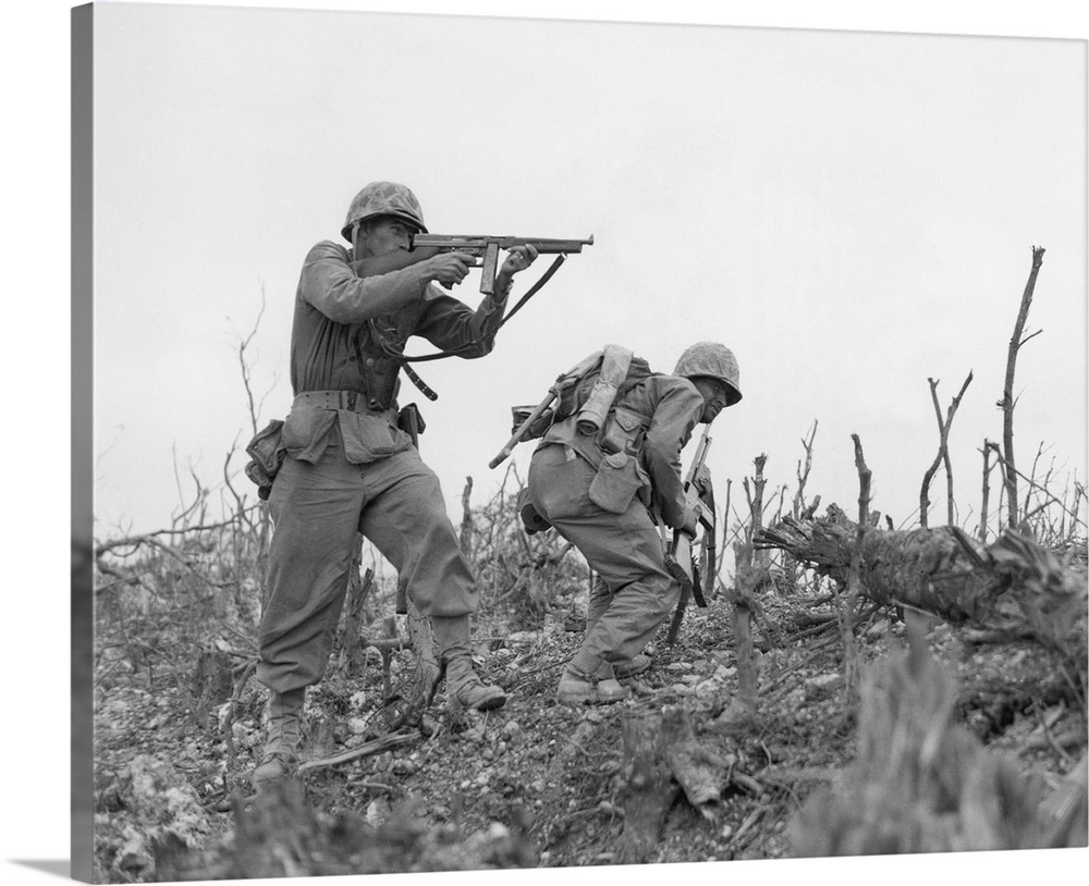A U.S. Marine takes aim at a Japanese sniper near the town of Shuri, Okinawa, 1945.
