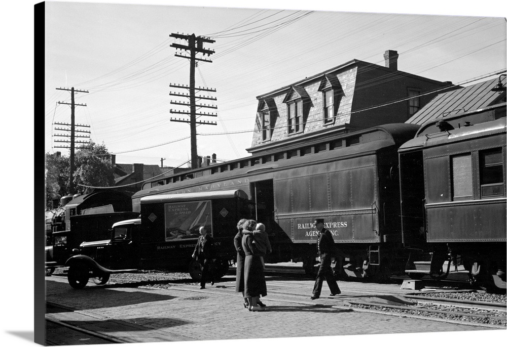 Passengers arriving at the railroad station in Hagerstown, Maryland. Photograph by Arthur Rothstein, 1937.