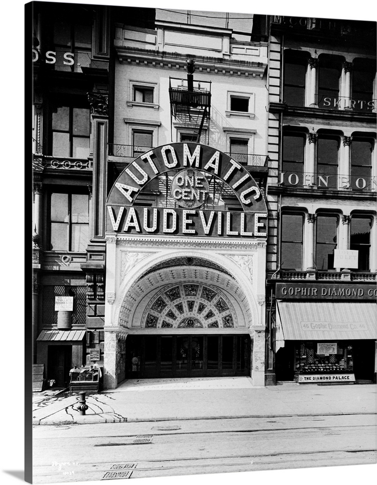 The Automatic One Cent Vaudeville, a peep show arcade at 48 East 14th Street, New York City, 1890s.